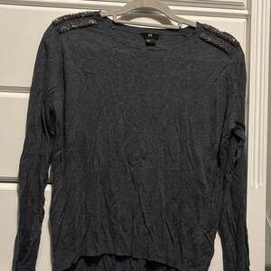 H&M Acrylic and Viscose beaded shoulder long sleeve top size M
